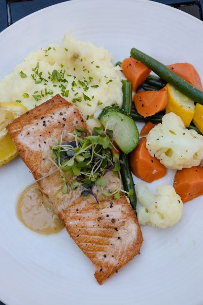 Geyserville Grille pan seared salmon with mashed potatoes and steamed vegetables.