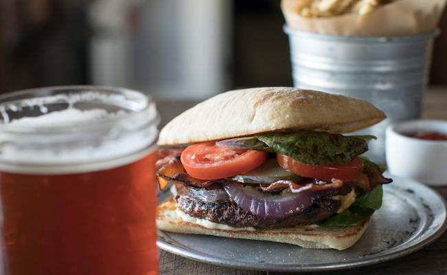 Rocker Oysterfeller's gourmet burger, beer, and fries.